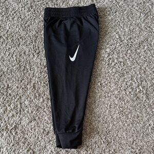 Nike Kids Black Sweatpants with White Logo